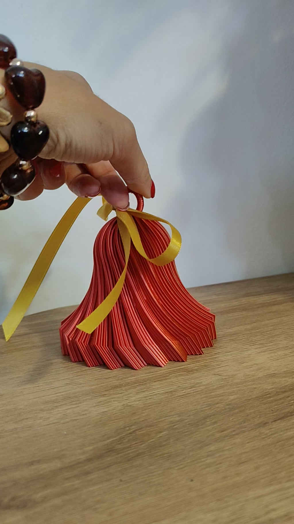 campanella magica twist in 3d rosso/oro 10 cm