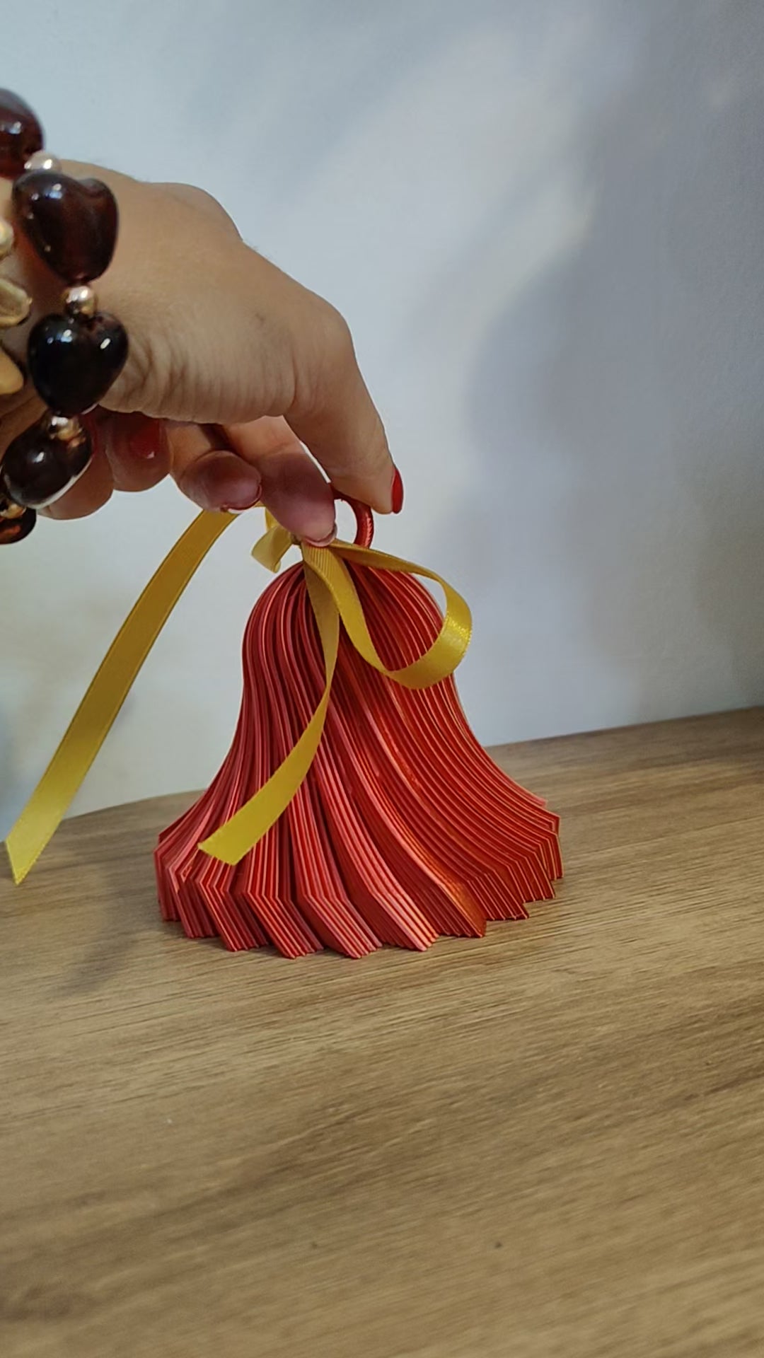 campanella magica twist in 3d rosso/oro 10 cm